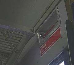 British train alarm, near car ceiling