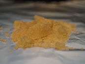 Image of a chunk of impure MDMA