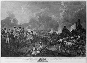 Black and white print shows a busy scene filled with mounted officers, soldiers, gunners and teamsters. In the background there is a city being bombarded with lots of smoke.