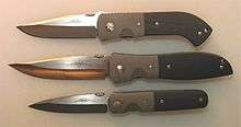 3 folding fighting knives with micarta handles and titanium bolsters