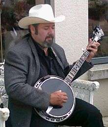 "Tom Hanway with his banjo