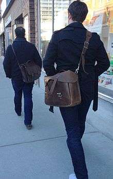 Men carrying satchels.