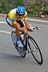 Cyclist in a race with helmet on