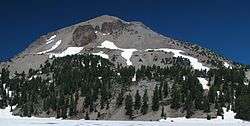 Conical baren peak with rock outcrops