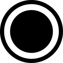 A black circle outline with a smaller, filled in black circle inside it.