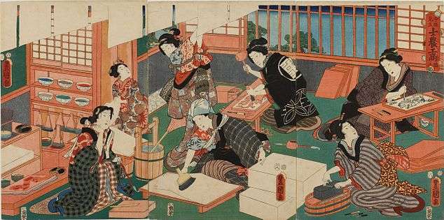 A colour print of a group of well-dressed Japanese women making prints