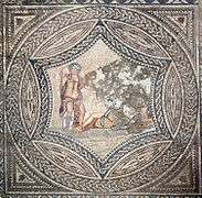 Top-down view of an elaborate geometric mosaic with a circular inset showing Bacchus encountering the sleeping Ariadne