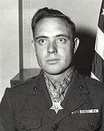 black and white headshot of Hershel Williams in his military uniform