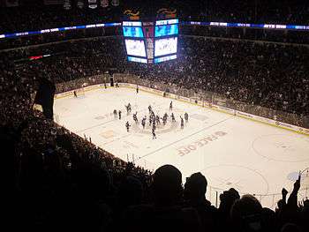 An interior view of the ice rink and stands at MTS Centre as the fans and players celebrate the team's first home victory