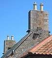 Witches' stones on tiled roof Jersey 3.jpg