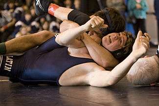 An example of a cradle, done by a high school wrestler on his opponent in collegiate (or scholastic) wrestling.