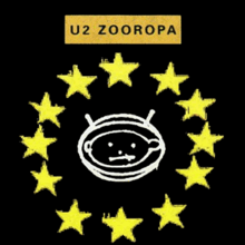 A white outline of a baby's head inside of an oval space helmet, set against a black background. The baby looks directly at the viewer. Twelve yellow five-pronged stars encircle the baby's head. Above the stars is a golden coloured rectangular box with the words U2 and Zooropa written in black capital letters inside of it.